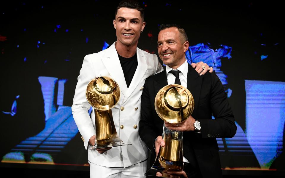 Ronaldo and his agent Jorge Mendes - REUTERS