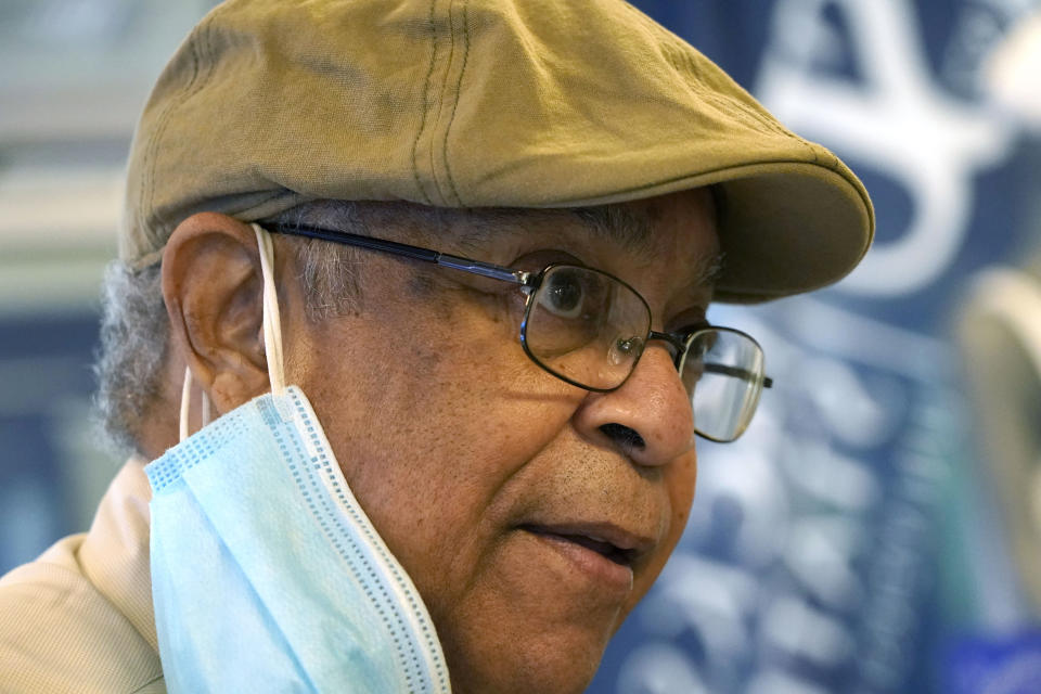 James "Lap" Baker, a 1970 Jackson State College graduate, speaks on May 13, 2021, in Jackson, Miss., about the May 15, 1970, incident where white local police and Mississippi Highway Patrol troopers marched onto campus of the historically Black school and opened fire on students, claiming they had seen a sniper. Baker is among about 70 graduates being honored as the school, now called Jackson State University, is holding a graduation ceremony 51 years after it canceled the 1970 commencement after the violence. (AP Photo/Rogelio V. Solis)