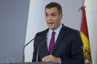 Spain's caretaker Prime Minister Pedro Sanchez makes a statement at the Moncloa Palacenin Madrid, Spain, Wednesday, Oct. 16, 2019. Spain's government met other national political leaders Wednesday and said it would do whatever it takes to stamp out violence in Catalonia, where clashes between regional independence supporters and police have injured more than 200 people in two days after Spain's Supreme Court on Monday handed nine separatist Catalan leaders lengthy prison sentences for their part in an October 2017 effort to achieve independence. (AP Photo/Paul White)