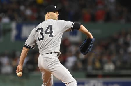 Sep 28, 2018; Boston, MA, USA; New York Yankees starting pitcher J.A. Happ (34) pitches during the first inning against the Boston Red Sox at Fenway Park. Mandatory Credit: Bob DeChiara-USA TODAY Sports