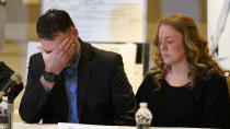 William Myre, his wife Sheri, the parents of Tate More, appear during a news conference in Southfield, Mich., Thursday, Jan. 27, 2022. A new lawsuit alleging negligence by school officials and a Michigan school shooting suspect's parents was filed over the attack at Oxford High School that killed four students and wounded six other students and a teacher. (AP Photo/Paul Sancya)