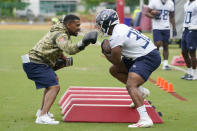 Tennessee Titans running back Julius Chestnut (36) takes part in a drill at the NFL football team's practice facility Tuesday, May 24, 2022, in Nashville, Tenn. (AP Photo/Mark Humphrey)