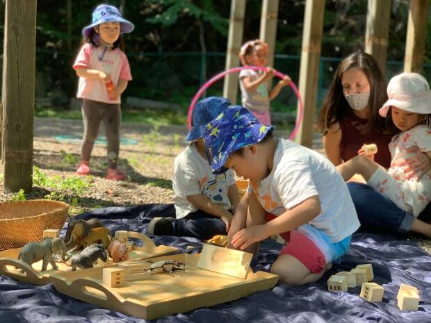 Children play at a child-care centre at Mount Saint Vincent University in Halifax on Tuesday, July 13, 2021, the day a $605-million affordable child-care agreement was announced. (Michael Gorman/CBC - image credit)