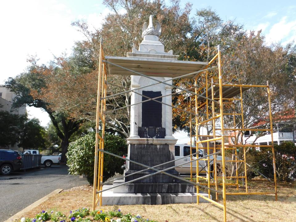 The monument is seen here after it was damaged with black paint.