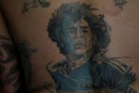 The Wider Image: Argentines celebrate 'eternal love' for Maradona with tattoos