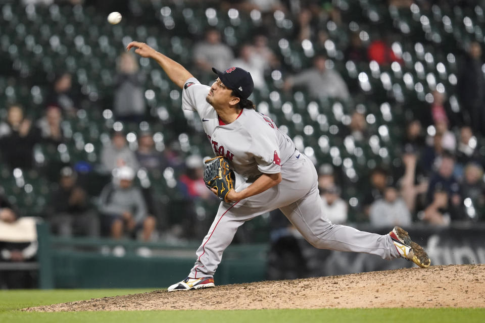 Boston Red Sox relief pitcher Hirokazu Sawamura delivers during the eighth inning of the team's baseball game against the Chicago White Sox Thursday, May 26, 2022, in Chicago. (AP Photo/Charles Rex Arbogast)