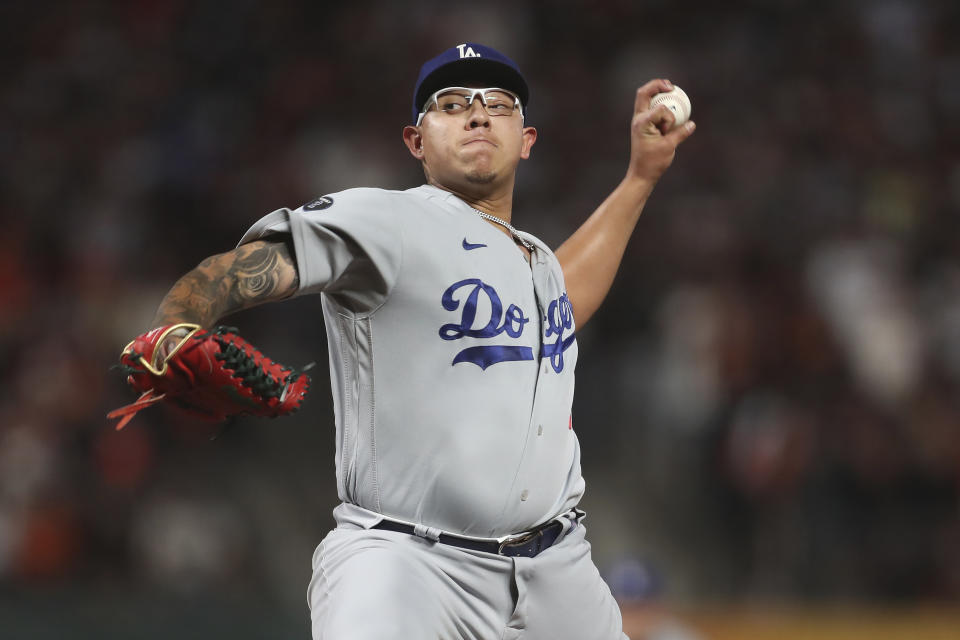 Los Angeles Dodgers' Julio Urias pitches against the San Francisco Giants during the third inning of Game 5 of a baseball National League Division Series Thursday, Oct. 14, 2021, in San Francisco. (AP Photo/Jed Jacobsohn)