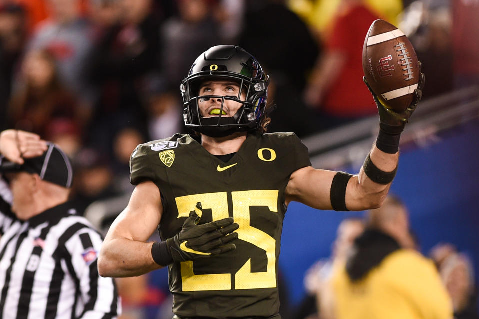 Oregon Ducks safety Brady Breeze (25) celebrates after his first-half interception against the Utah Utes on Saturday. (Cody Glenn/Getty Images)