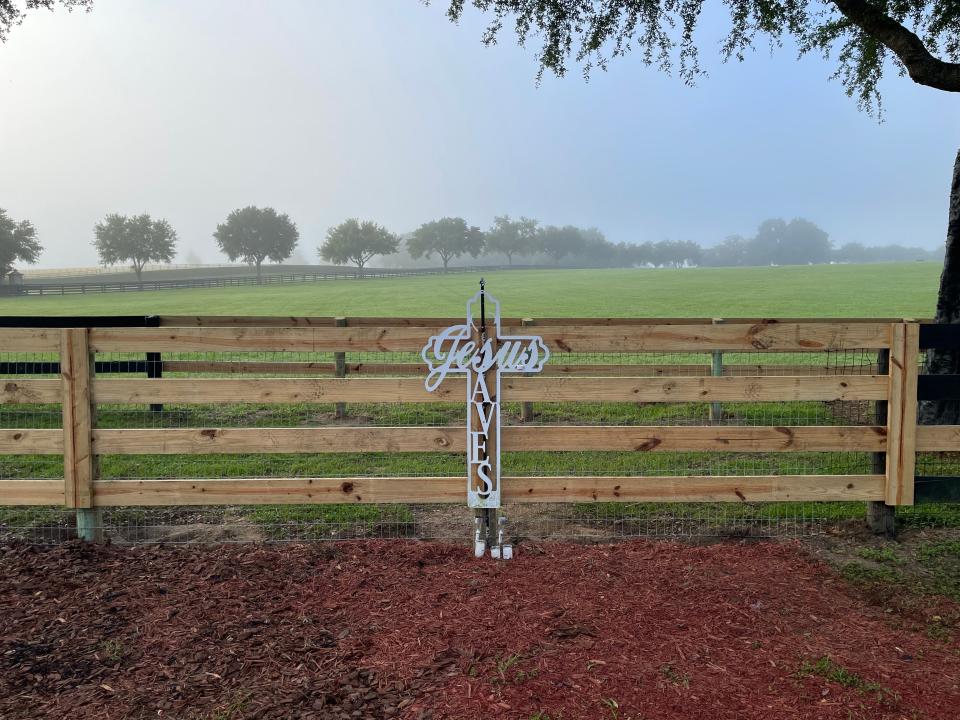 This is the only marker left at the site where eight migrant workers were killed in a two-vehicle crash on May 14.