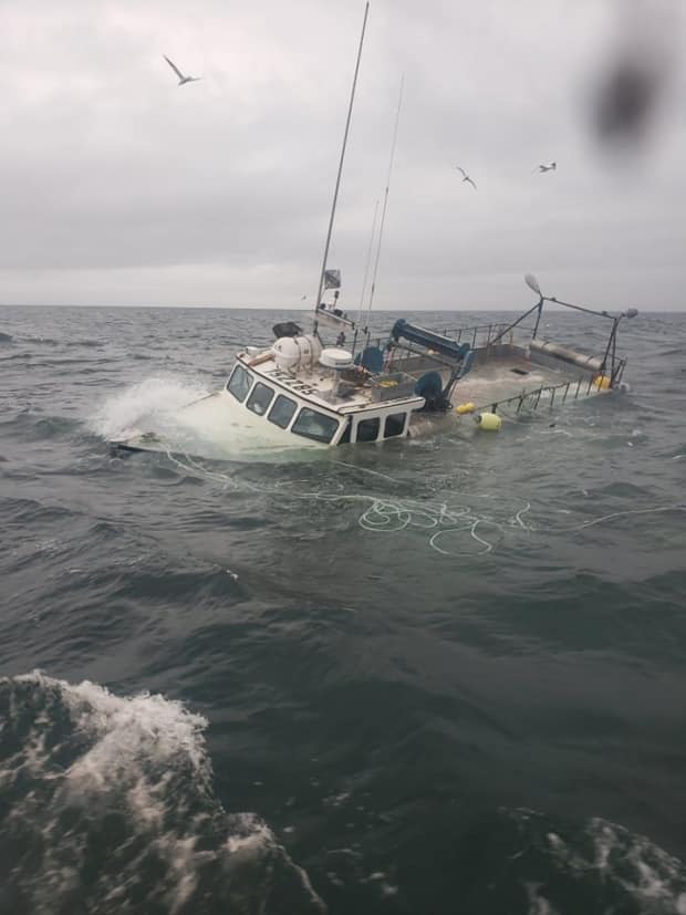 The captain decided to abandon ship after the fishing boat took on too much water. (Submitted by Steven Hughes - image credit)