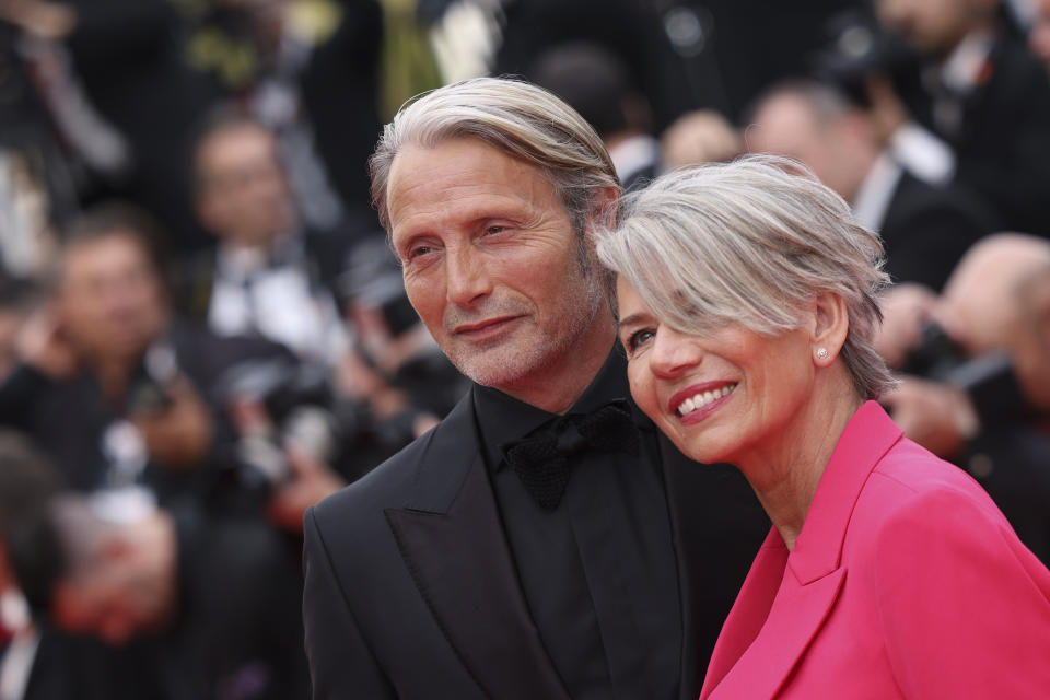 Mads Mikkelsen, left, Hanne Jacobsen pose for photographers upon arrival at the opening ceremony and the premiere of the film 'Jeanne du Barry' at the 76th international film festival, Cannes, southern France, Tuesday, May 16, 2023. (Photo by Vianney Le Caer/Invision/AP)