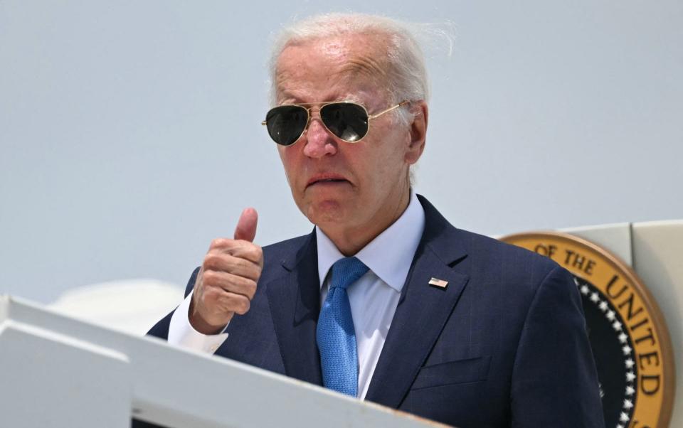 Joe Biden boards Air Force One as he departs for Washington from Dover Air Force Base in Delaware