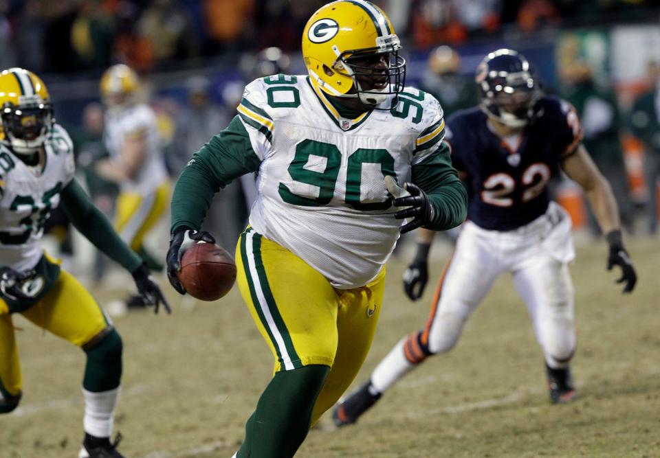 2011: Green Bay Packers defensive tackle B.J. Raji returns an interception for a touchdown against the Chicago Bears in the 4th quarter at Soldiers Field in Chicago Sunday.