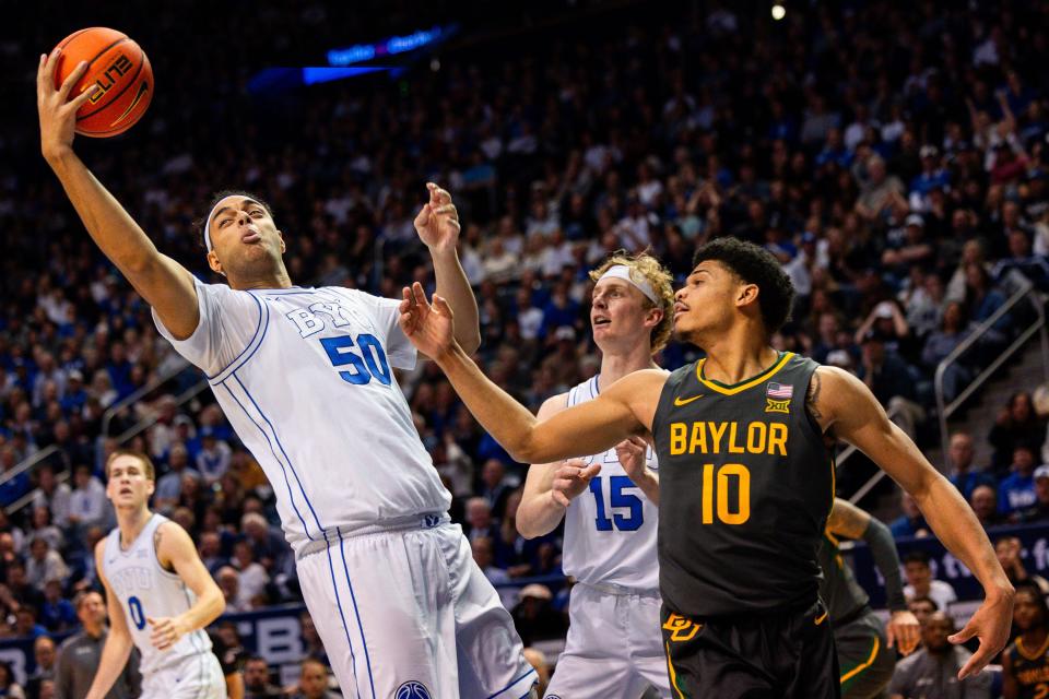 Brigham Young Cougars center Aly Khalifa (50) grabs a rebound during a men’s college basketball game between Brigham Young University and Baylor University at the Marriott Center in Provo on Tuesday, Feb. 20, 2024. | Megan Nielsen, Deseret News