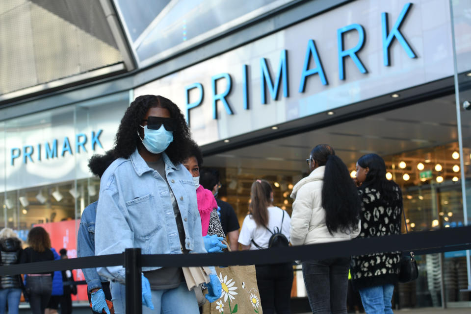 Shoppers in line at Primark in Birmingham as non-essential shops in England open their doors to customers for the first time since coronavirus lockdown restrictions were imposed in March. (Photo by Jacob King/PA Images via Getty Images)