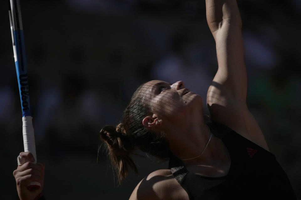 Maria Sakkari of Greece serves to Czech Republic's Barbora Krejcikova during their semifinal match of the French Open tennis tournament at the Roland Garros stadium Thursday, June 10, 2021 in Paris. (AP Photo/Christophe Ena)