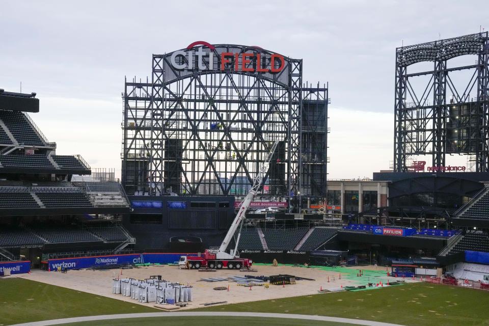 Citi Field under construction is seen during the off season, Tuesday, Jan. 31, 2023, in New York. The Mets are moving in the Citi Field fence for the third time, reducing right-center by 8 1/2 feet to create additional fan gathering space. The team brought in the wall by as much as 12 feet after 2011 and lowered the fence height from 16 to 8 feet in left, then brought in fences by 3 to 11 feet in front of the bullpens in right field ahead of 2015. (AP Photo/Mary Altaffer)