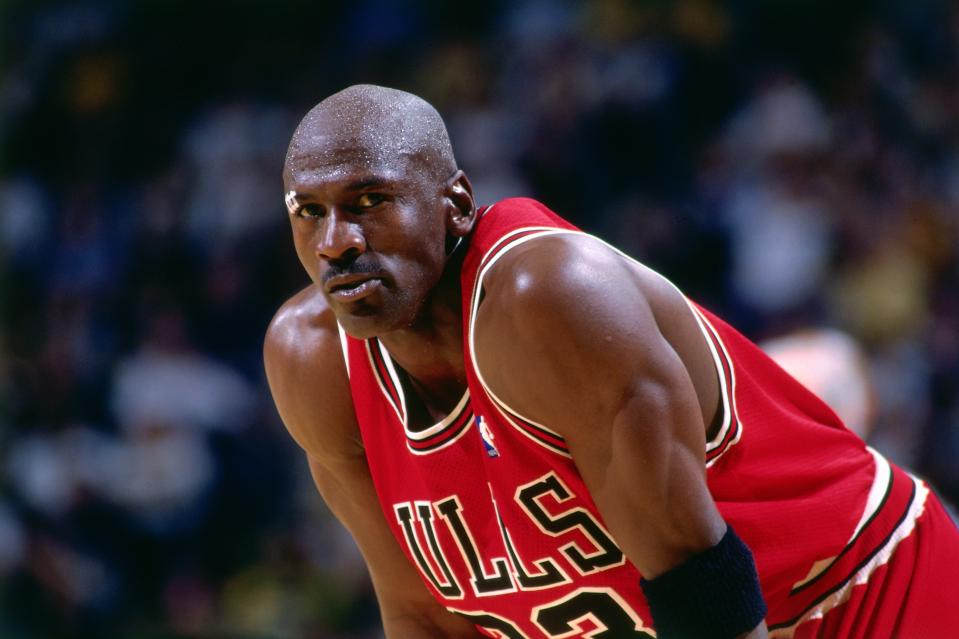 INDIANAPOLIS - MAY 25:  Michael Jordan #23 of the Chicago Bulls looks on during a game played on May 25, 1998 at the Market Square Arena in Indianapolis, Indiana.  NOTE TO USER: User expressly acknowledges and agrees that, by downloading and or using this photograph, User is consenting to the terms and conditions of the Getty Images License Agreement. Mandatory Copyright Notice: Copyright 1998 NBAE  (Photo by Nathaniel S. Butler/NBAE via Getty Images)