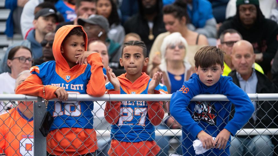 Spectators watch the football game between Millville and Lenape played at John Barbose Stadium at Wheaton Field in Millville on Friday, September 29, 2023.  