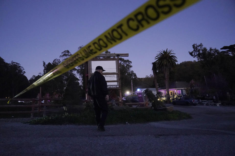 Police tape is placed near the scene of a shooting Monday, Jan. 23, 2023, in Half Moon Bay, Calif. Multiple people were killed in two related shootings Monday at a mushroom farm and a trucking firm in a coastal community south of San Francisco, and officials say a suspect is in custody. (AP Photo/Jeff Chiu)