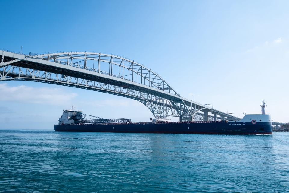 The 740-foot Algoma Sault passes under the Blue Water Bridge while traveling downbound on the St. Clair River Wednesday, April 8, 2020, in Port Huron.