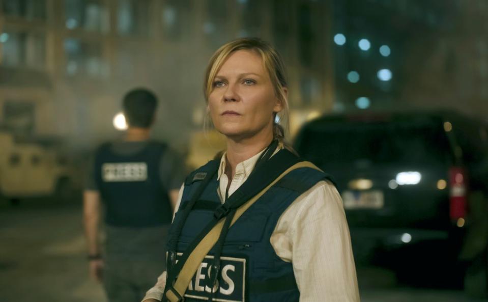 Kirsten Dunst is a hardened photojournalist named Lee Smith. AP