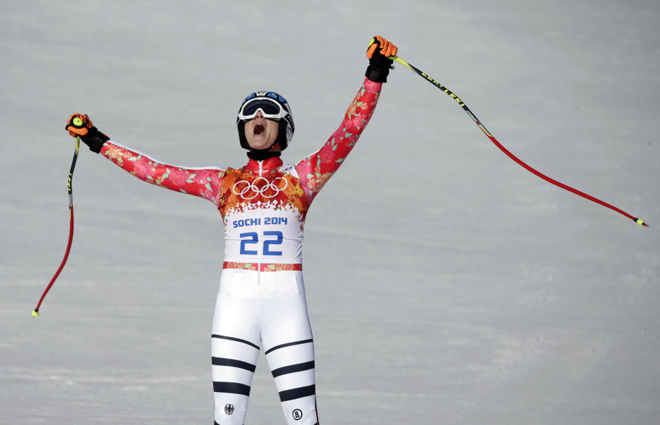 Germany's Maria Hoefl-Riesch celebrates after finishing the women's super-G at the Sochi 2014 Winter Olympics, Saturday, Feb. 15, 2014, in Krasnaya Polyana, Russia. (AP Photo/Gero Breloer, File)