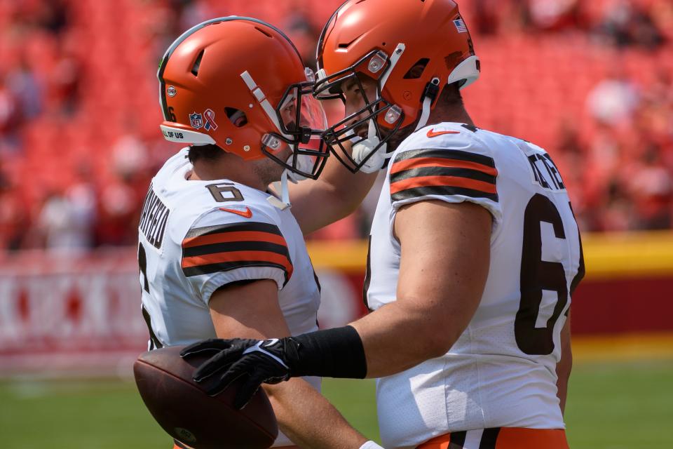 Browns quarterback Baker Mayfield (left) greets Browns center JC Tretter during pregame warmups before playing the Chiefs, Sunday, Sept.12, 2021 in Kansas City, Mo. (AP Photo/Reed Hoffmann)