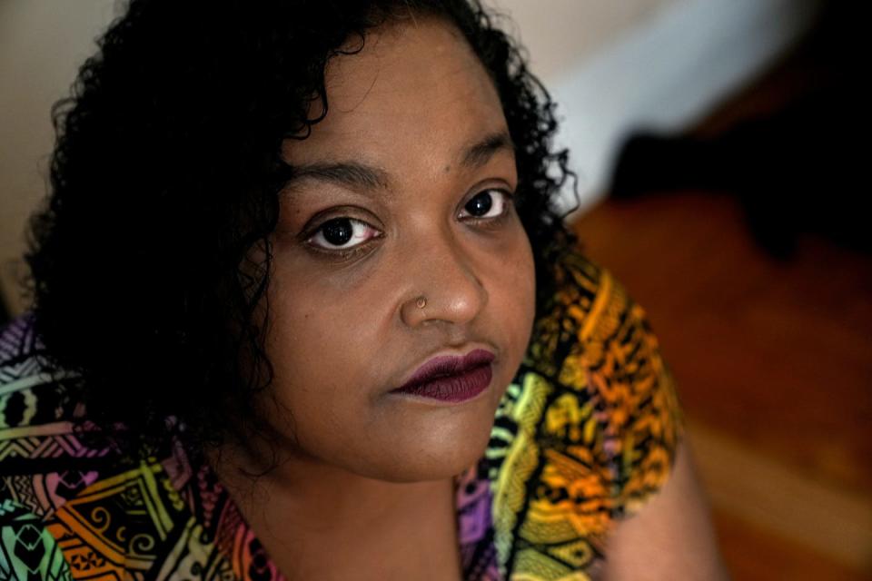 Torrell Mola, of Providence, a single mother with multiple sclerosis, suffered when her power was shut off for lack of payment during the hottest part of the summer.