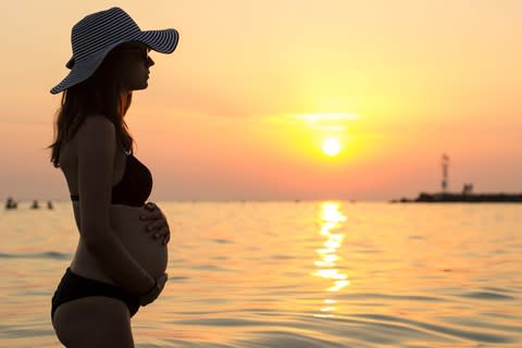 A pregnant woman by the sea - Credit: istock