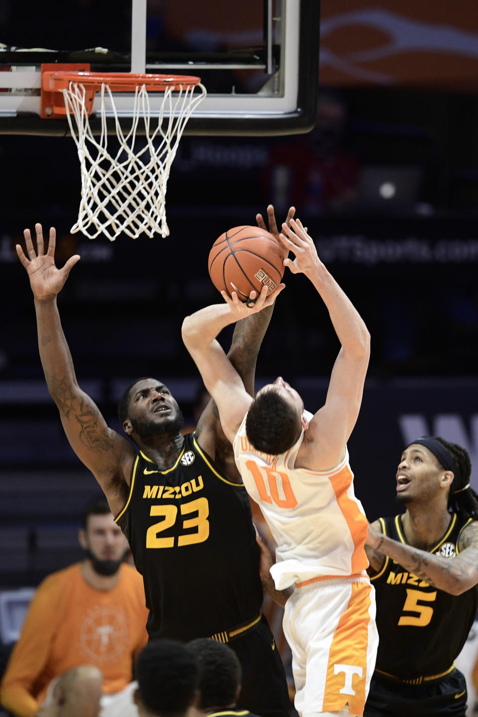 Missouri forward Jeremiah Tilmon (23) defends against Tennessee forward John Fulkerson (10) during an NCAA college basketball game Saturday, Jan. 23, 2021, in Knoxville, Tenn. (Calvin Mattheis/Knoxville New-Sentinel via AP, pool)