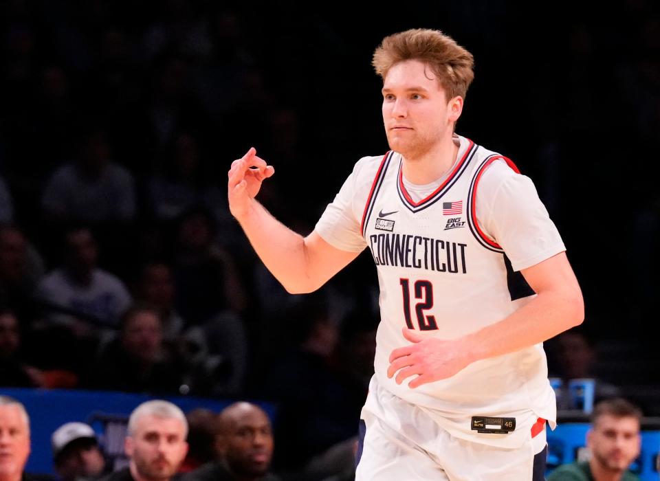 Connecticut Huskies guard Cam Spencer (12) reacts against the Stetson Hatters in the first round of the 2024 NCAA Tournament at the Barclays Center. Mandatory Credit: Robert Deutsch-USA TODAY Sports