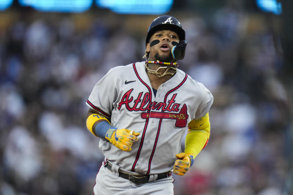 Atlanta Braves' Ronald Acuña Jr. runs the bases on a home run against the Los Angeles Dodgers during the third inning of a baseball game Saturday, Sept. 2, 2023, in Los Angeles. (AP Photo/Jae C. Hong)