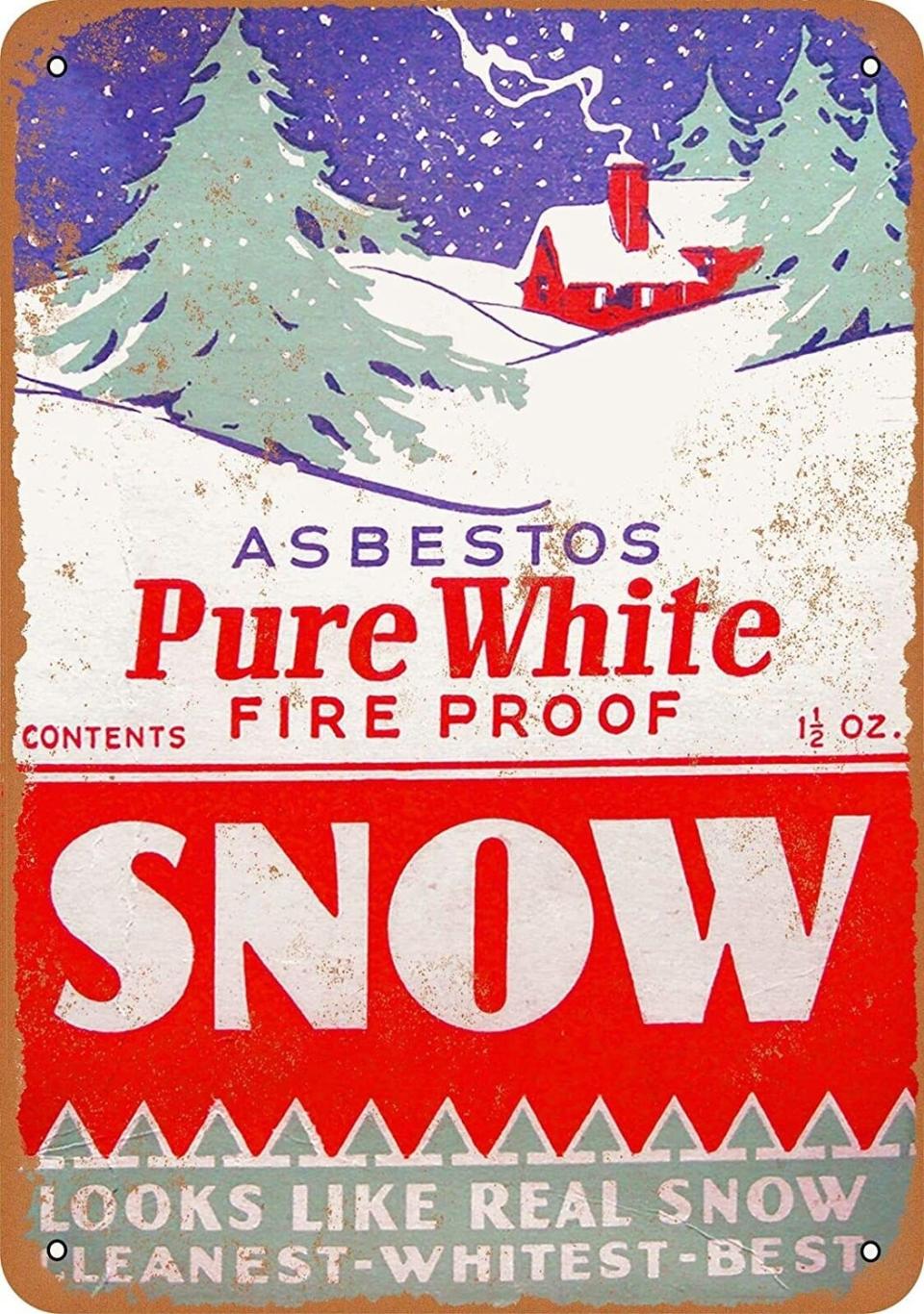 The box cover for fake snow made of asbestos that reads, "Asbestos Pure White, Fire Proof Snow. Looks like real snow. Cleanest, whitest, best"