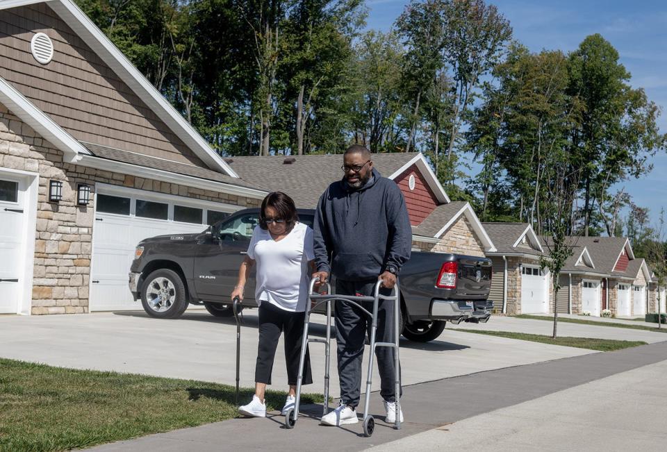 A year later, David Upshaw uses a walker to get around. He takes daily walks with his wife, Patricia. He suffers from vertigo. He recently underwent eye surgery and spends four hours, three days a week undergoing dialysis.