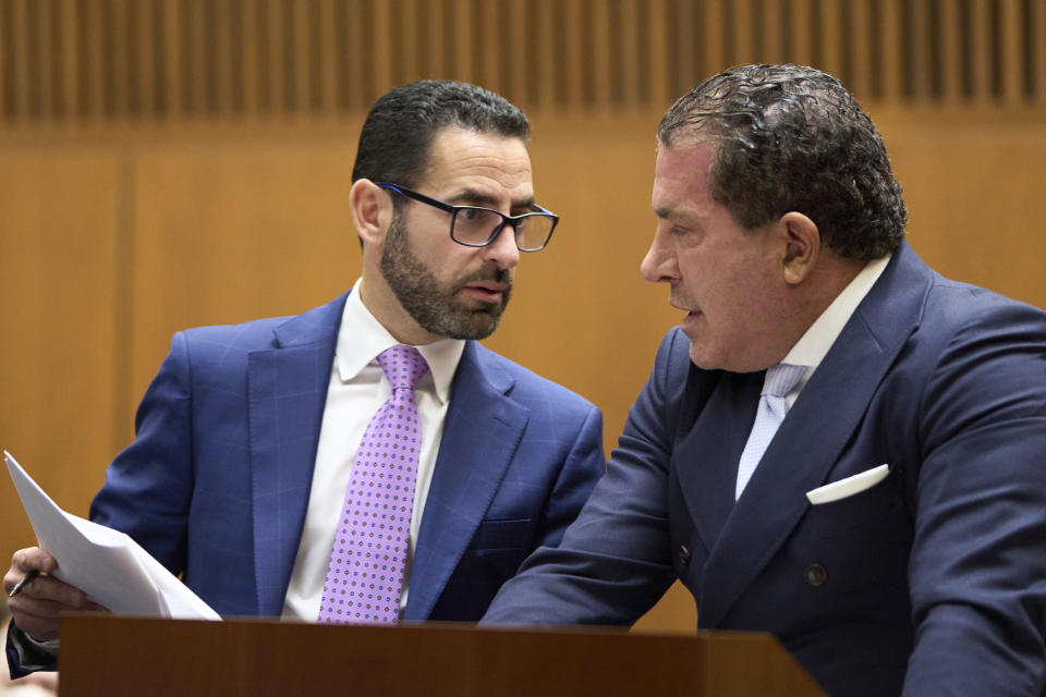 Joe Tacopina, right, defense attorney for Rakim Mayers, aka A$AP Rocky, talks with a member of his legal team in the Clara Shortridge Foltz Criminal Justice Center during a preliminary hearing in Rocky's assault with a semiautomatic firearm case in Los Angeles, on Monday, Nov. 20, 2023. The charges stem from a November 2021 incident where Rocky allegedly pointed a semi-automatic handgun at Terell Ephron and fired multiple times. (Allison Dinner/EPA via AP, Pool)