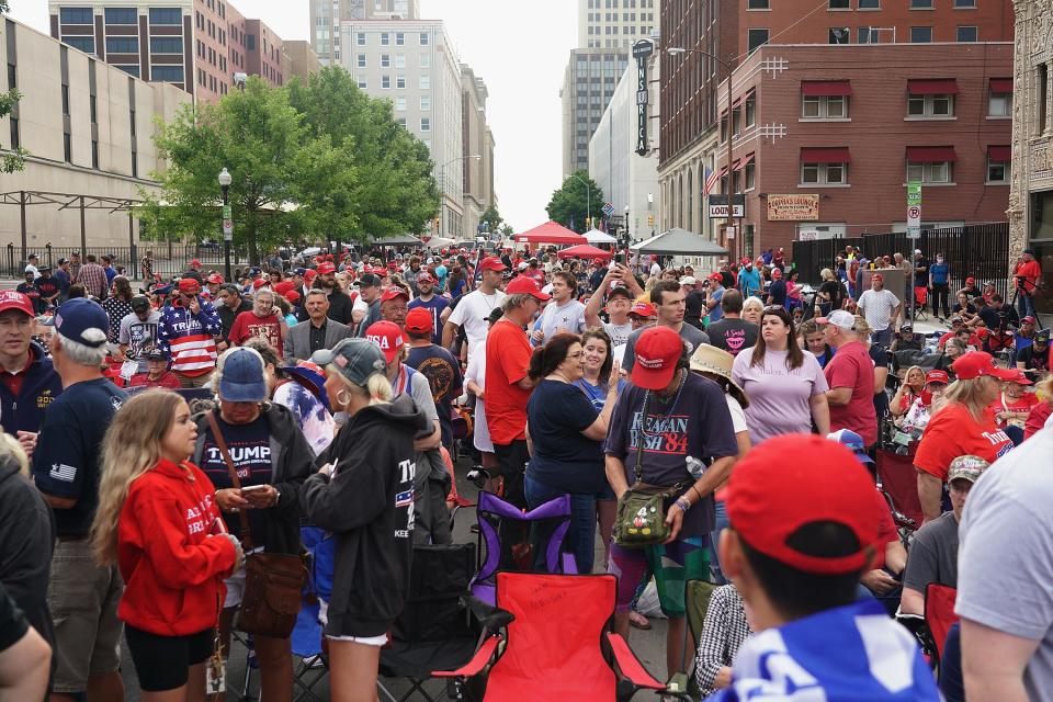 The mostly maskless crowd waiting to get into BOK Center on June 20, 2020.