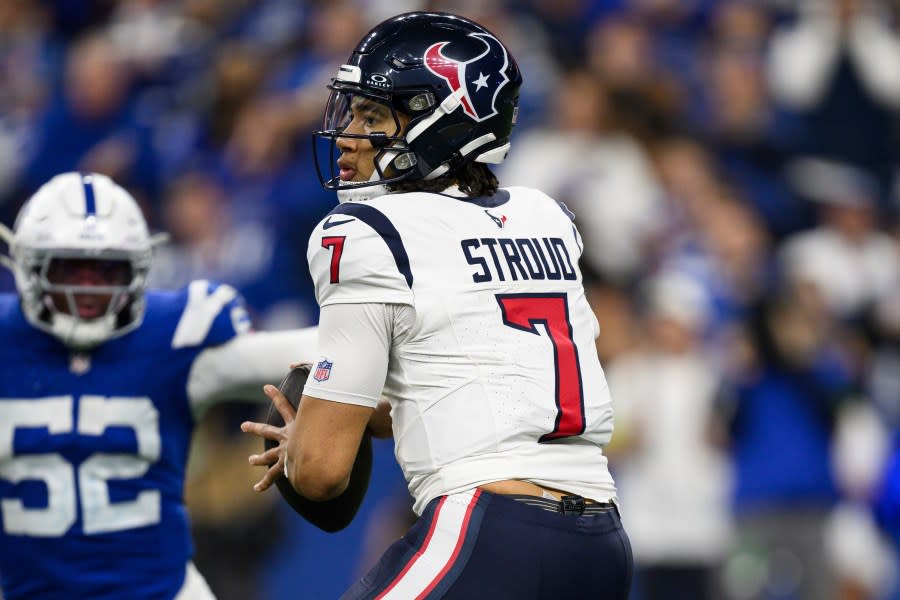 Houston Texans quarterback C.J. Stroud (7) looks downfield during an NFL football game against the Indianapolis Colts, Saturday, Jan. 6, 2024, in Indianapolis. (AP Photo/Zach Bolinger)