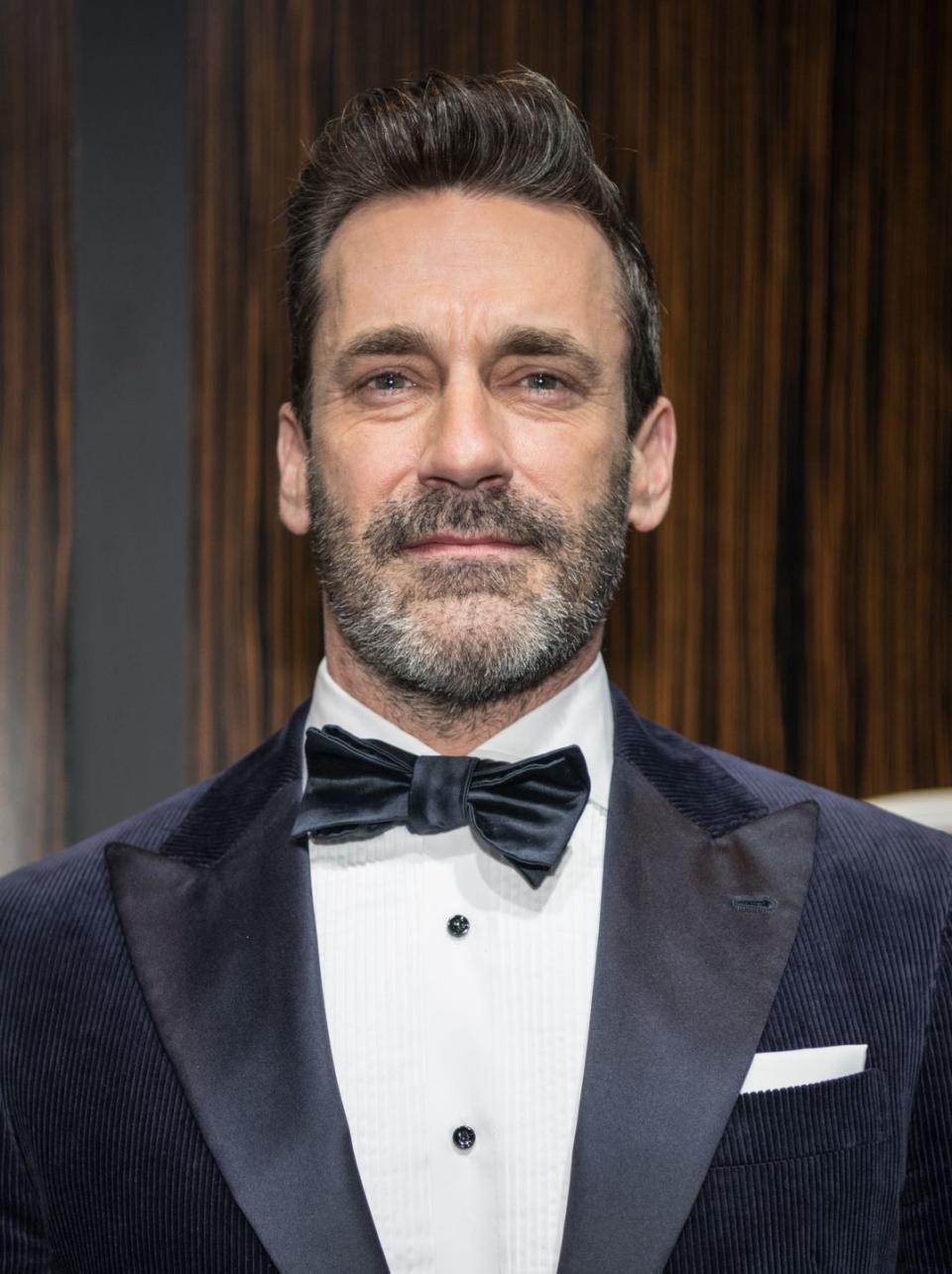 <p>The actor still looks dapper after letting the hair at his temples and beard go gray. Here he is at a 2019 Oscars viewing party. </p>