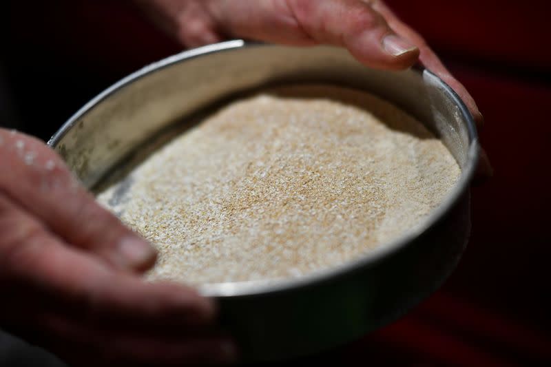 Freshly milled flour is seen inside the family run Shipton Mill in Tetbury