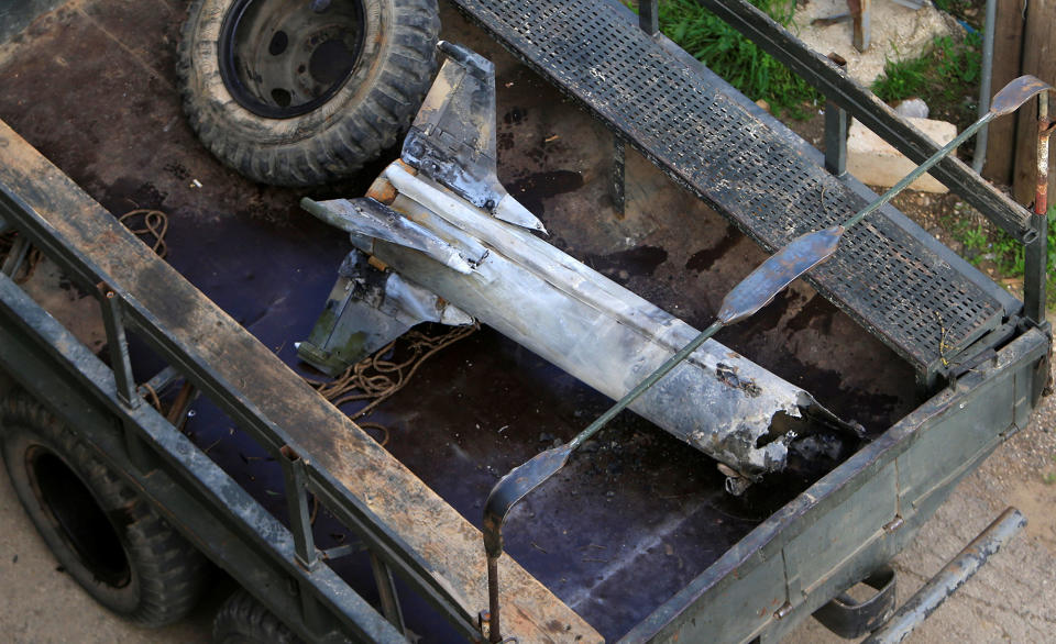 <p>A part of a missile is seen in a Lebanese army truck in Kawkaba, Lebanon, Feb. 10, 2018. (Photo: Ali Hashisho/Reuters) </p>