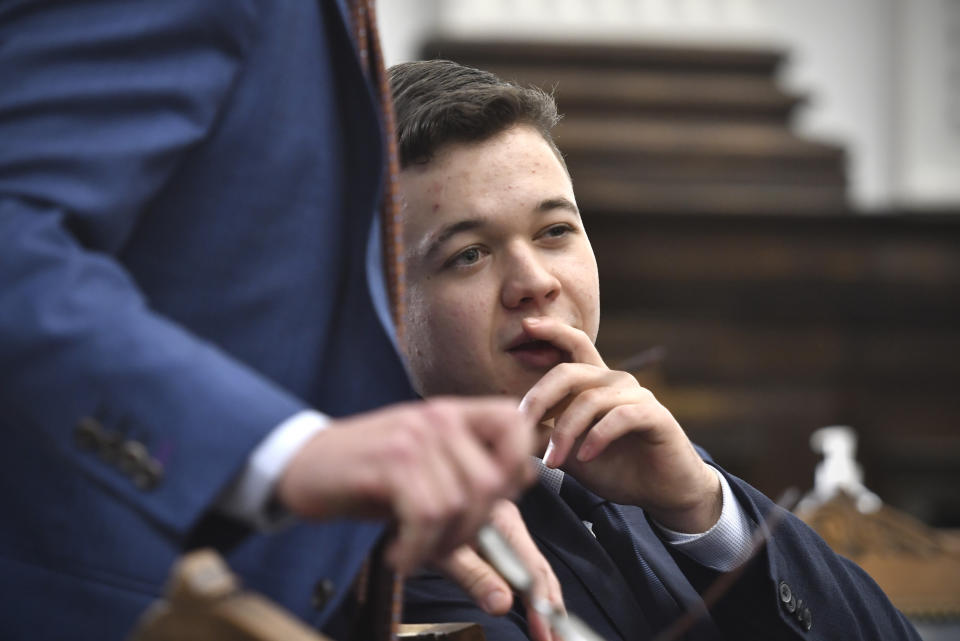 Kyle Rittenhouse waits for his trial to begin for the day at the Kenosha County Courthouse in Kenosha, Wis., on Wednesday, Nov. 10, 2021. Rittenhouse is accused of killing two people and wounding a third during a protest over police brutality in Kenosha, last year. (Sean Krajacic/The Kenosha News via AP, Pool)