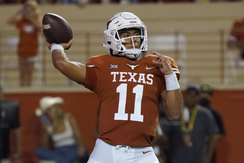 Texas quarterback Casey Thompson (11) looks to throw a pass against the Rice during the first half of an NCAA college football game Saturday, Sept. 18, 2021, in Austin, Texas. (AP Photo/Chuck Burton)