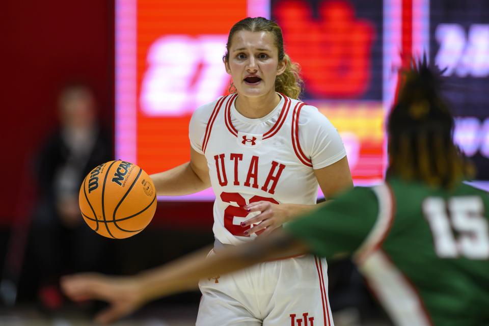 Utah guard Matyson Wilke (23) dribbles the ball on offense while being defended by Mississippi Valley forward Sadie Williams (15) during an NCAA basketball game on Monday, Nov. 6, 2023 in Salt Lake City, Utah. | Tyler Tate, Associated Press