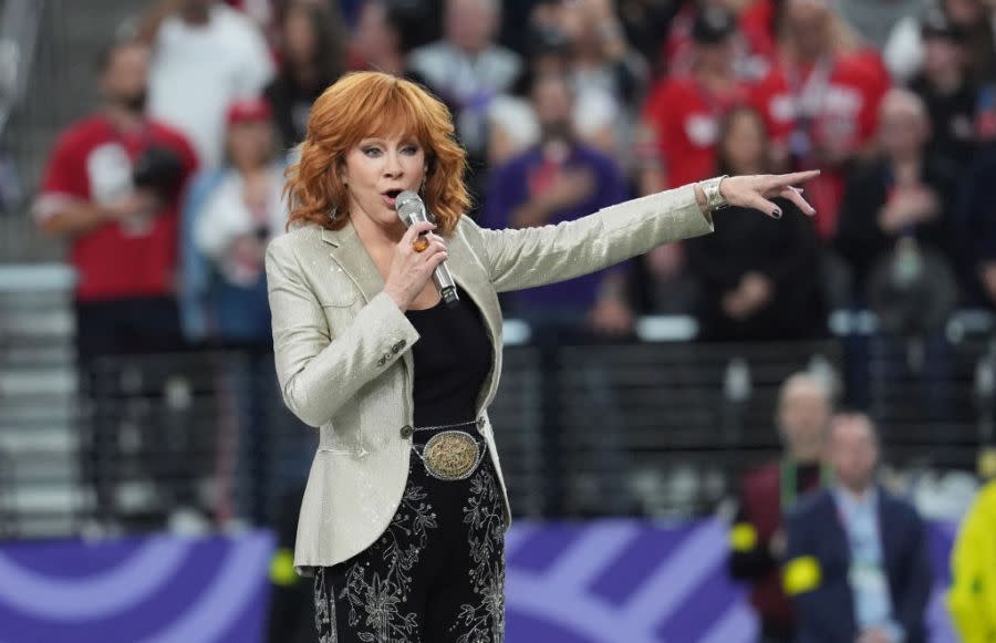 US singer Reba McEntire sings the National Anthem ahead of Super Bowl LVIII between the Kansas City Chiefs and the San Francisco 49ers at Allegiant Stadium in Las Vegas, Nevada, February 11, 2024. (Photo by TIMOTHY A. CLARY / AFP) (Photo by TIMOTHY A. CLARY/AFP via Getty Images)
