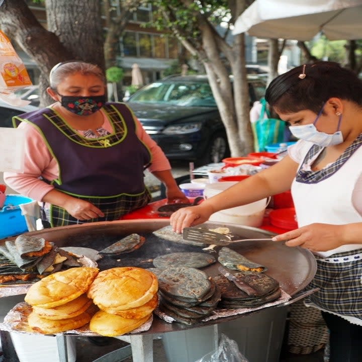 Jenni the quesadilla lady making quesadillas on the street.