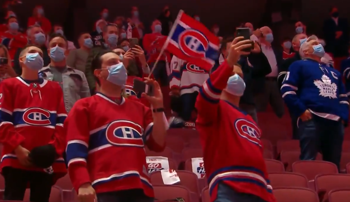 O Canada - Canadian hockey fans cheer on Team USA