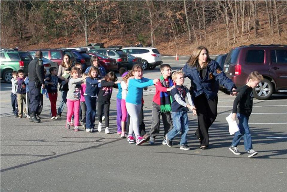 Students at Sandy Hook Elementary School after the Dec. 14, 2012 shooting