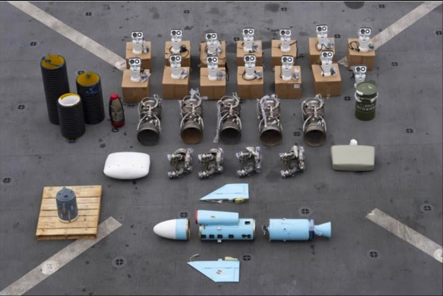 This undated photograph released by the U.S. military's Central Command shows what it is described as Iranian-made missile components bound for Yemen's Houthi seized off a vessel in the Arabian Sea. U.S. Navy SEALs seized Iranian-made missile parts and other weaponry from a ship bound for Yemen's Houthi rebels in a raid that saw two of its commandos go missing, the U.S. military said Tuesday, Jan. 16, 2024. (U.S. Central Command via AP)