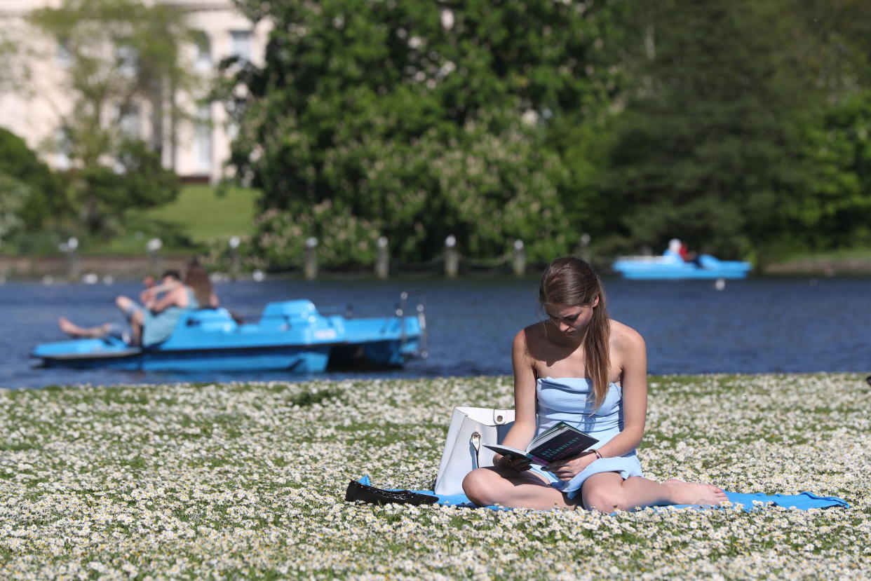 People enjoy the sun in Regent's Park London, as sun worshippers are set to sizzle in the spring heatwave, with Bank Holiday Monday forecast to be the hottest since records began.